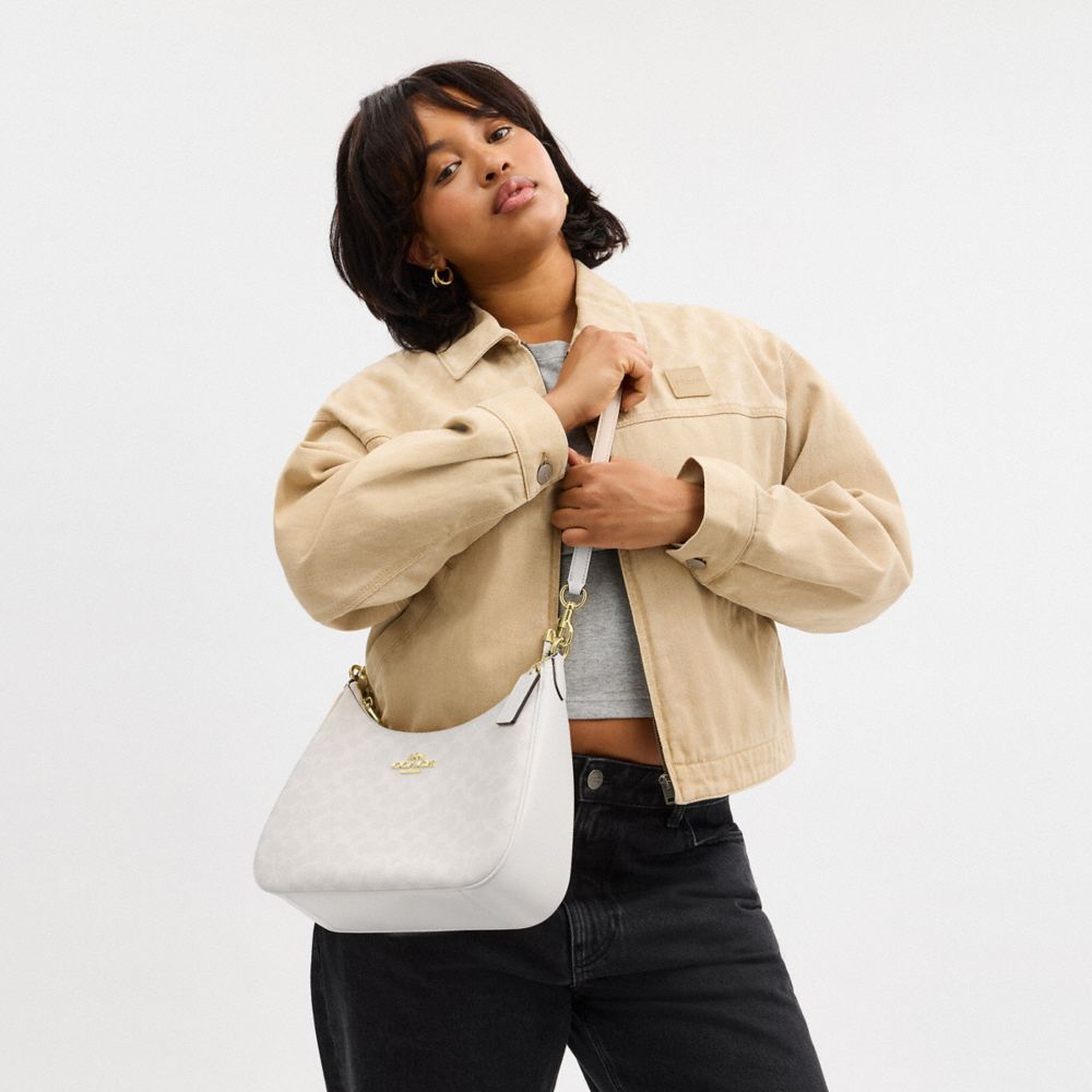 Teri Hobo Bag In Signature Canvas