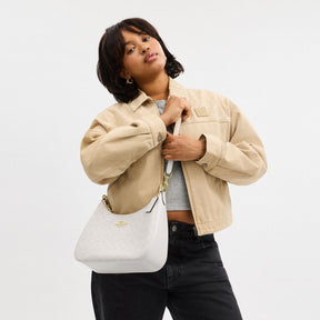 Teri Hobo Bag In Signature Canvas