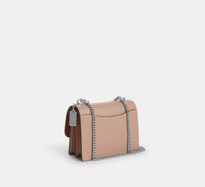 Klare Crossbody Bag In Signature Canvas With Rivets