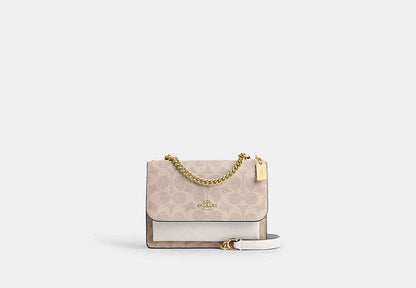 Mini Klare Crossbody Bag In Signature Canvas