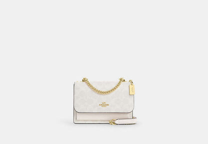 Mini Klare Crossbody Bag In Signature Canvas