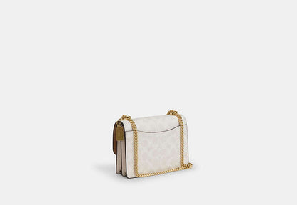 Mini Klare Crossbody Bag In Signature Canvas
