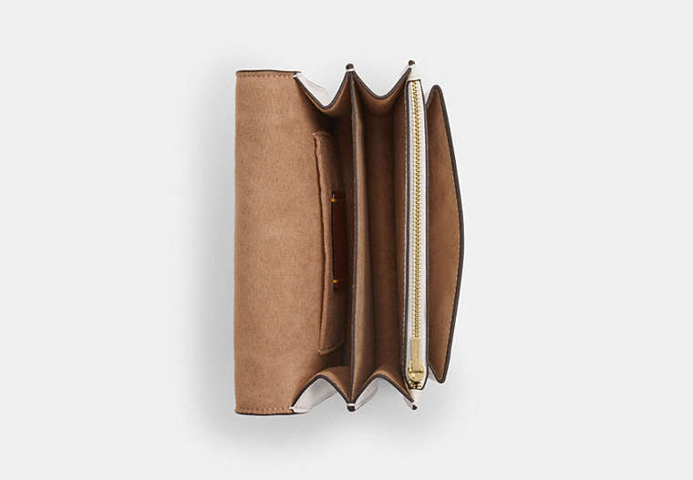 Mini Klare Crossbody Bag In Signature Canvas