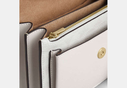 Mini Klare Crossbody Bag In Signature Canvas