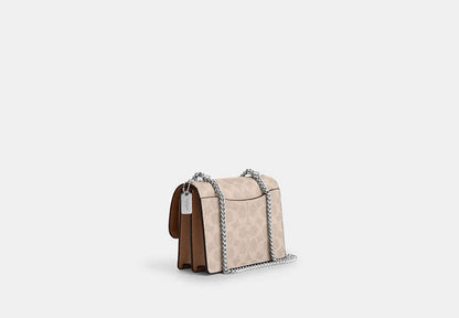 Mini Klare Crossbody Bag In Signature Canvas