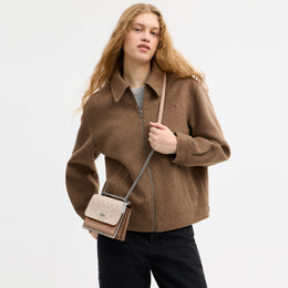 Mini Klare Crossbody Bag In Signature Canvas