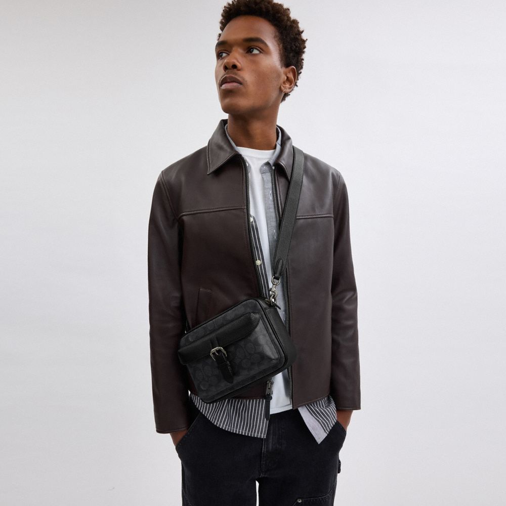 Warner Crossbody Bag In Signature Canvas