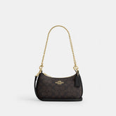 Teri Mini Crossbody Bag In Signature Canvas