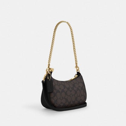 Teri Mini Crossbody Bag In Signature Canvas