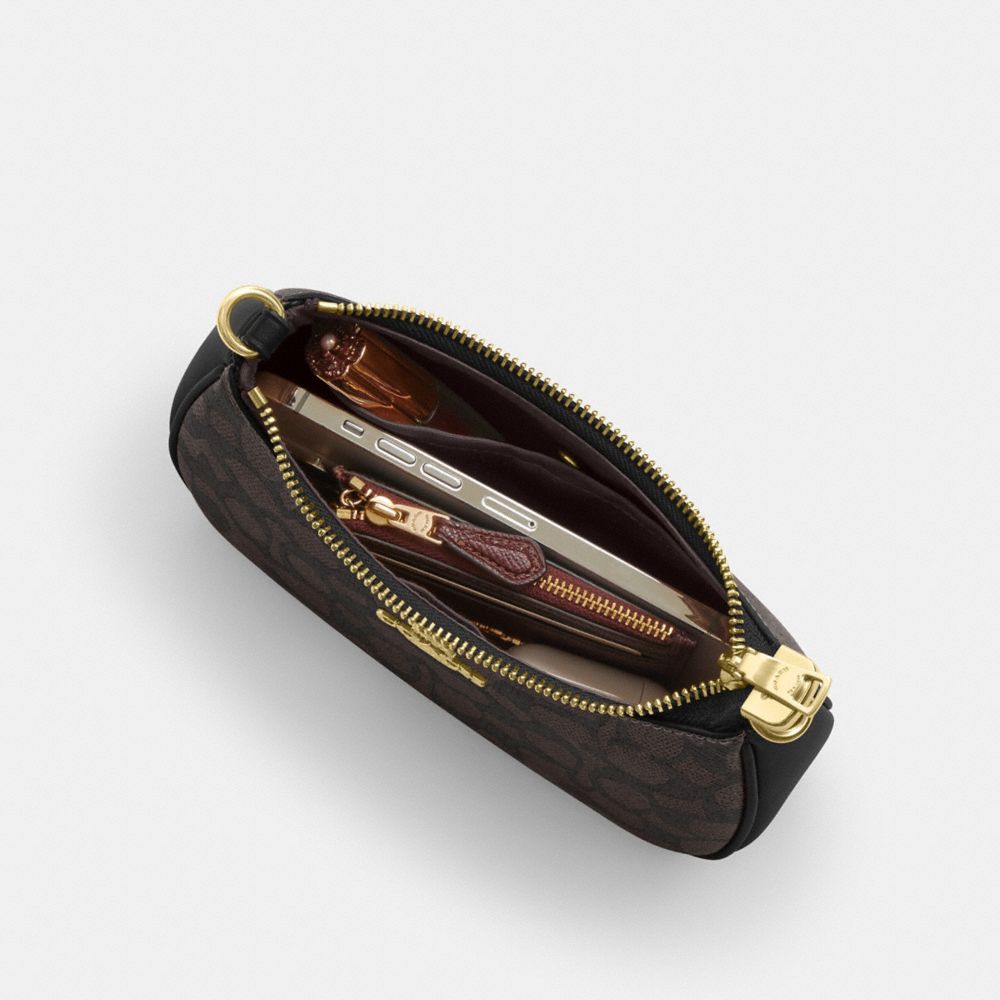 Teri Mini Crossbody Bag In Signature Canvas