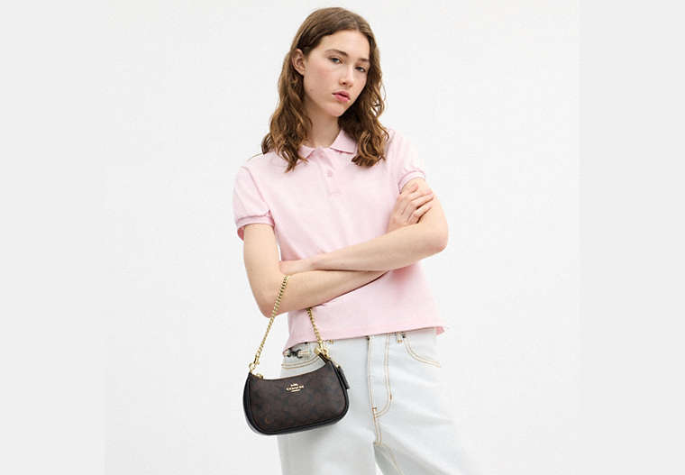 Teri Mini Crossbody Bag In Signature Canvas