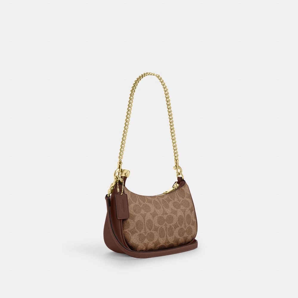 Teri Mini Crossbody Bag In Signature Canvas
