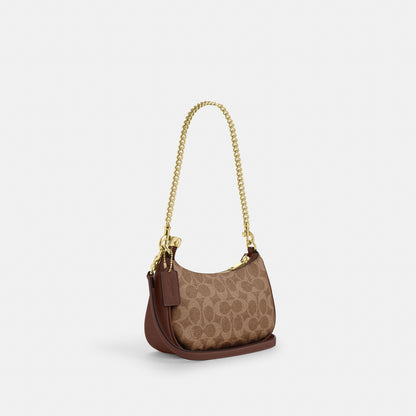 Teri Mini Crossbody Bag In Signature Canvas
