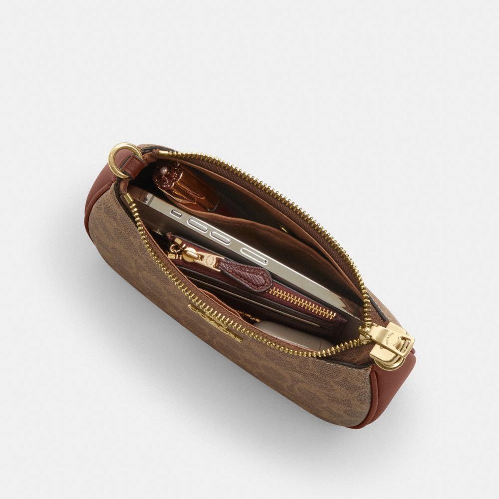 Teri Mini Crossbody Bag In Signature Canvas