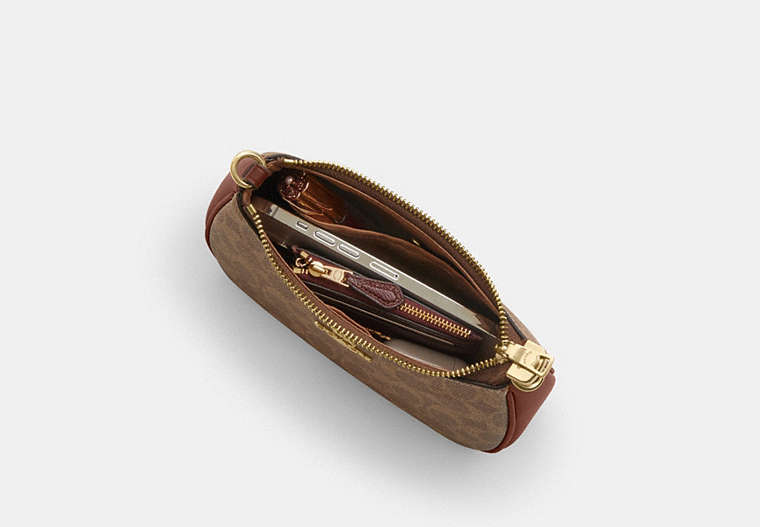 Teri Mini Crossbody Bag In Signature Canvas