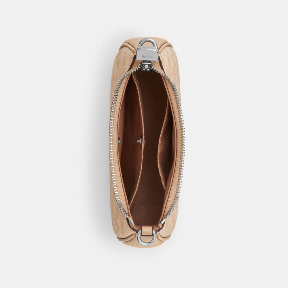 Teri Mini Crossbody Bag In Signature Canvas