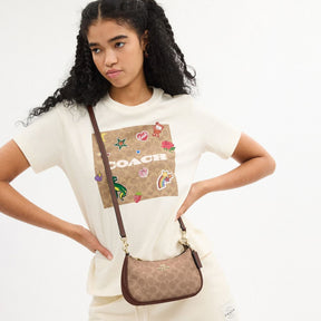 Teri Mini Crossbody Bag In Signature Canvas