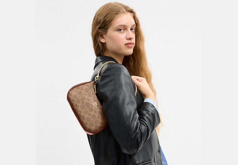 Teri Mini Crossbody Bag In Signature Canvas