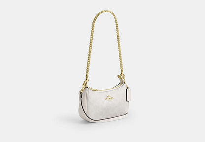 Teri Mini Crossbody Bag In Signature Canvas