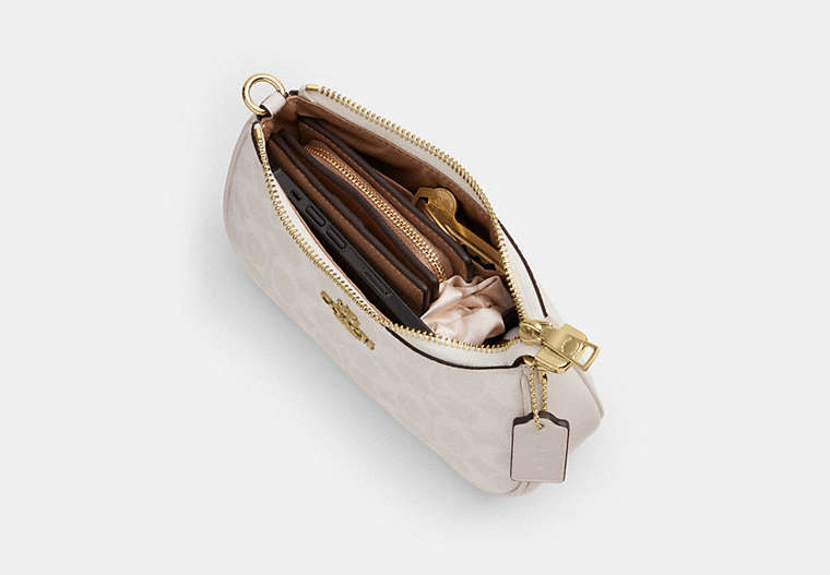 Teri Mini Crossbody Bag In Signature Canvas