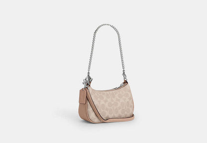 Teri Mini Crossbody Bag In Signature Canvas