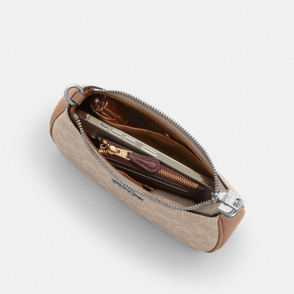 Teri Mini Crossbody Bag In Signature Canvas