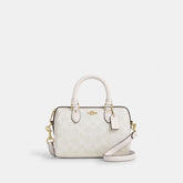 Mini Rowan Crossbody Bag In Signature Canvas