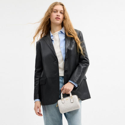 Mini Rowan Crossbody Bag In Signature Canvas