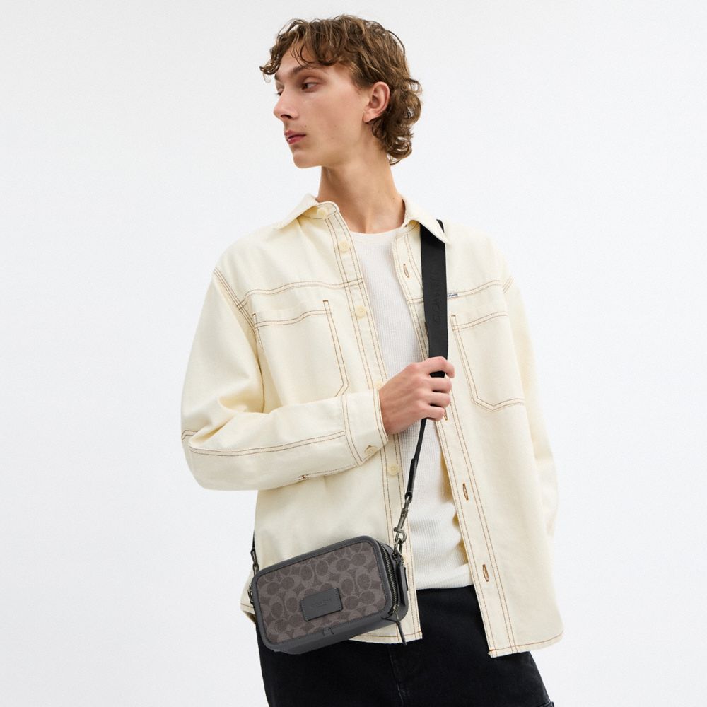 Wyatt Crossbody Bag In Signature Canvas
