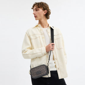 Wyatt Crossbody Bag In Signature Canvas