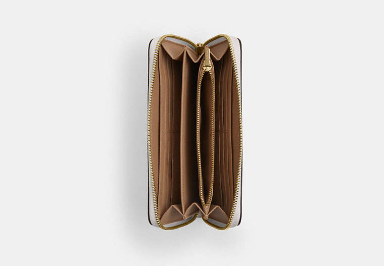 Long Zip Around Wallet In Signature Canvas