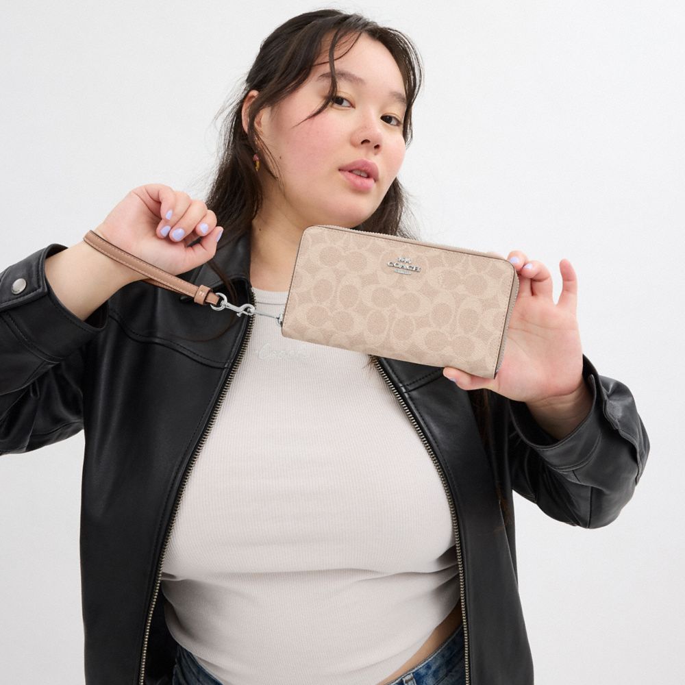 Long Zip Around Wallet In Signature Canvas With Stripe