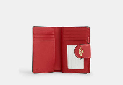 Medium Corner Zip Wallet In Signature Canvas