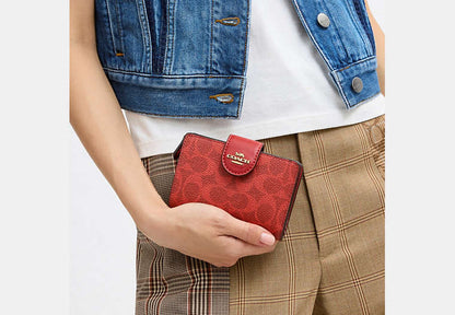 Medium Corner Zip Wallet In Signature Canvas