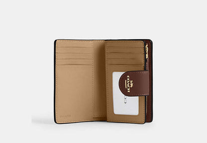 Medium Corner Zip Wallet In Signature Canvas