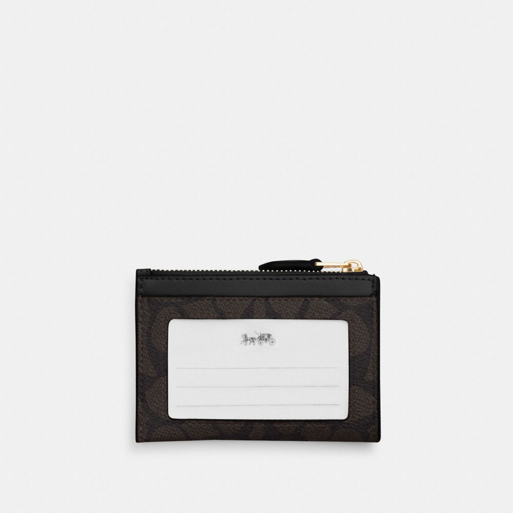 Mini Skinny Id Case In Signature Canvas