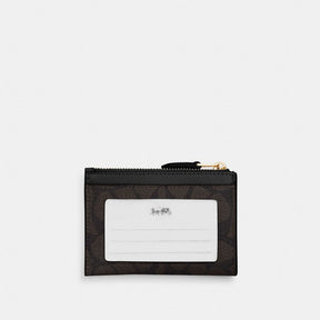 Mini Skinny Id Case In Signature Canvas