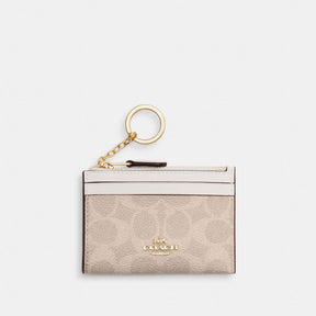 Mini Skinny Id Case In Signature Canvas