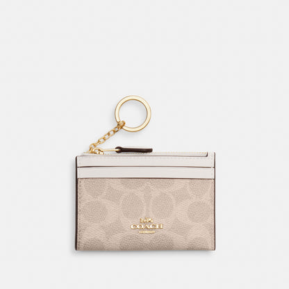 Mini Skinny Id Case In Signature Canvas