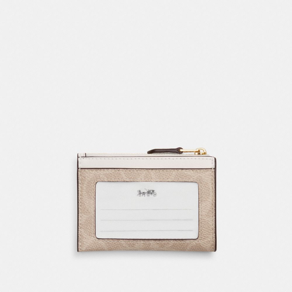 Mini Skinny Id Case In Signature Canvas