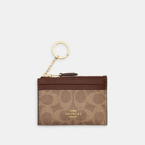 Mini Skinny Id Case In Signature Canvas