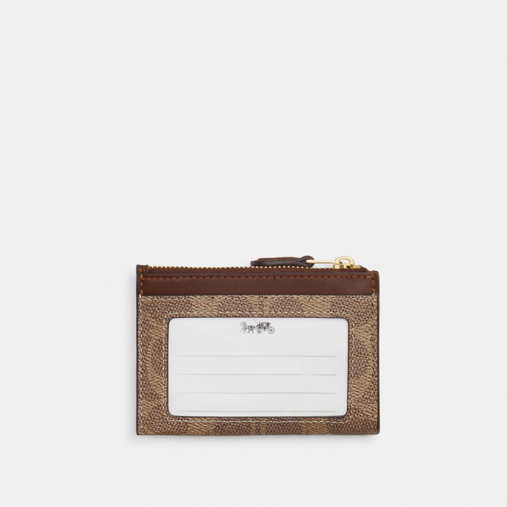 Mini Skinny Id Case In Signature Canvas