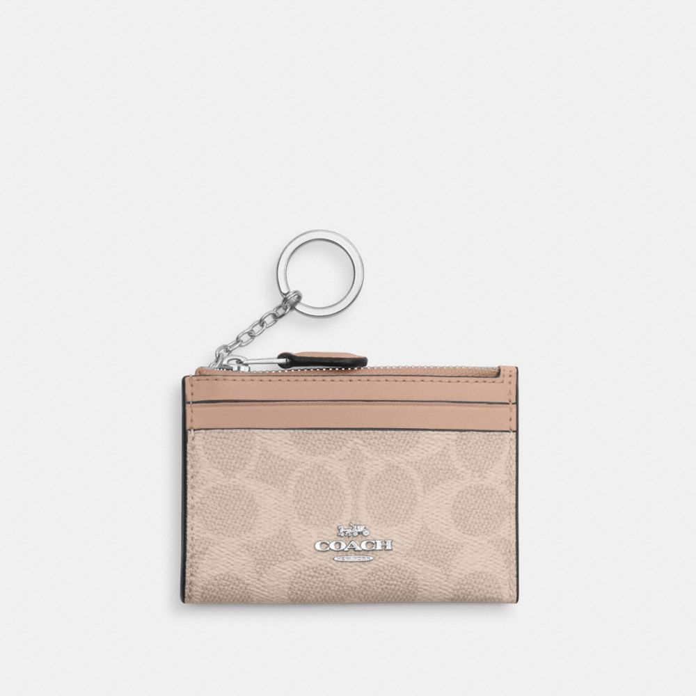 Mini Skinny Id Case In Signature Canvas