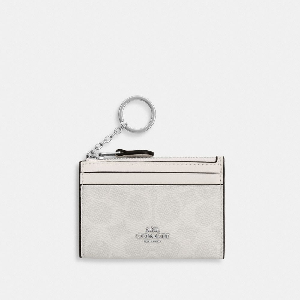 Mini Skinny Id Case In Signature Canvas
