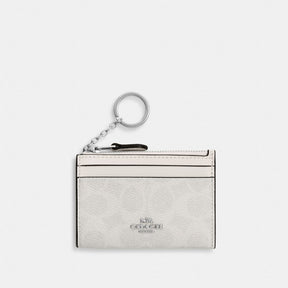 Mini Skinny Id Case In Signature Canvas