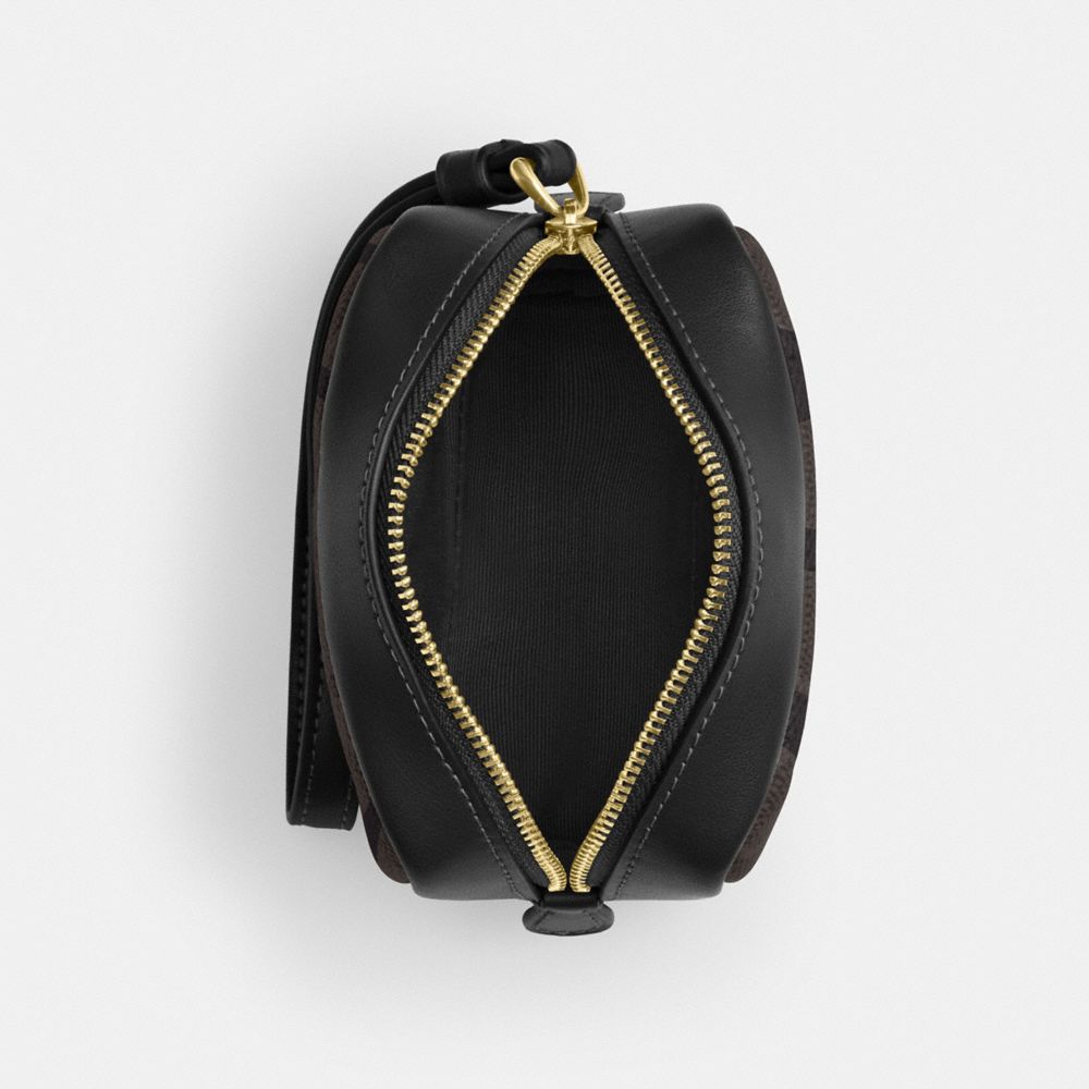 Pouch Wristlet In Signature Canvas