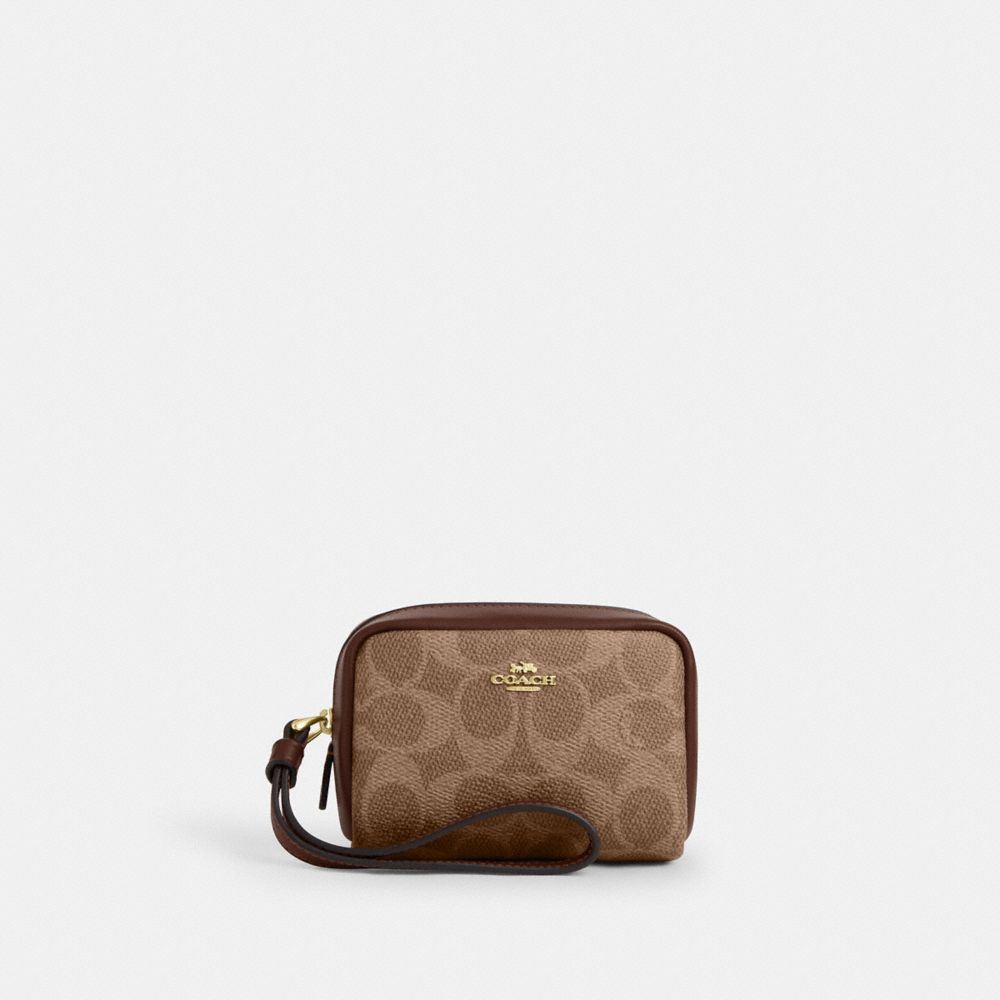 Pouch Wristlet In Signature Canvas