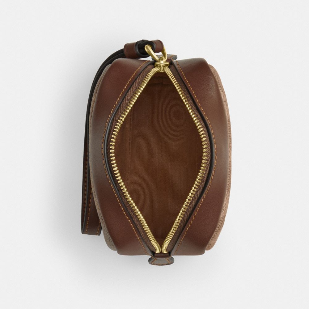 Pouch Wristlet In Signature Canvas