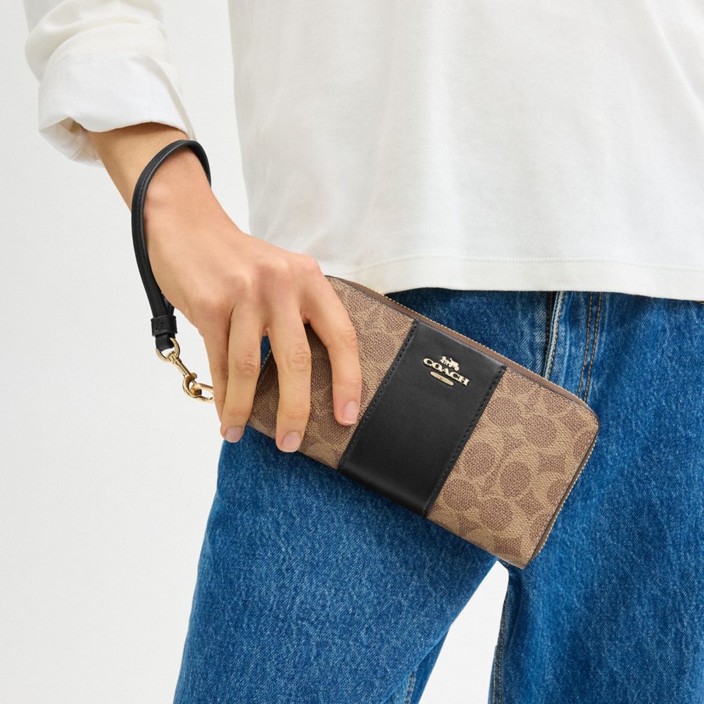 Long Zip Around Wallet In Signature Canvas With Stripe
