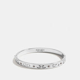 Signature Huggie Earrings